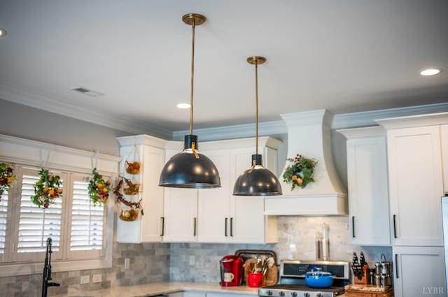 1010 Coles Ct, Forest, VA 24551 - kitchen featuring stove, white cabinetry, light countertops, decorative backsplash, and pendant lighting