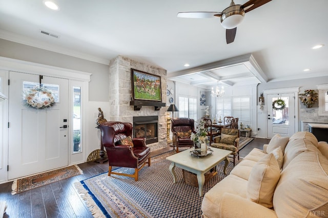 1010 Coles Ct, Forest, VA 24551 - living room with a fireplace, wood-type flooring, a chandelier, a ceiling fan, and crown molding