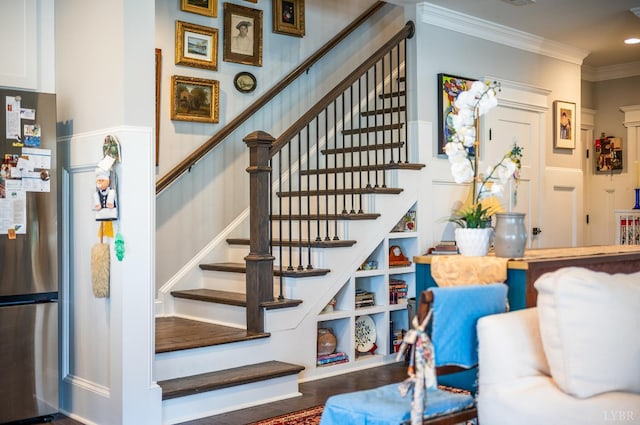 1010 Coles Ct, Forest, VA 24551 - stairway with ornamental molding, wood finished floors, and built in shelves
