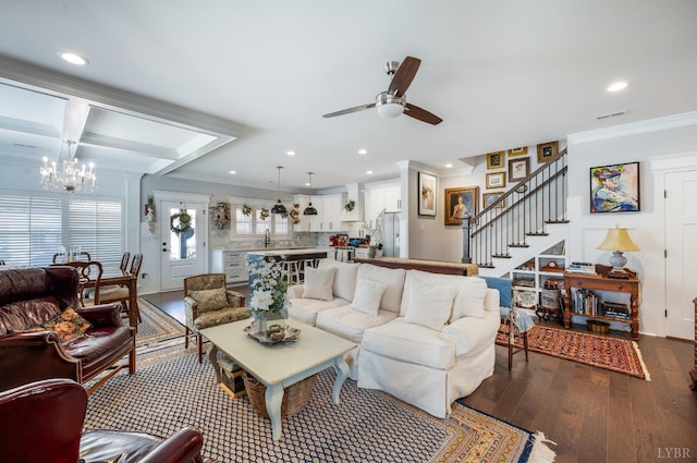 1010 Coles Ct, Forest, VA 24551 - living area featuring dark wood-style flooring, a chandelier, ornamental molding, ceiling fan, and stairway