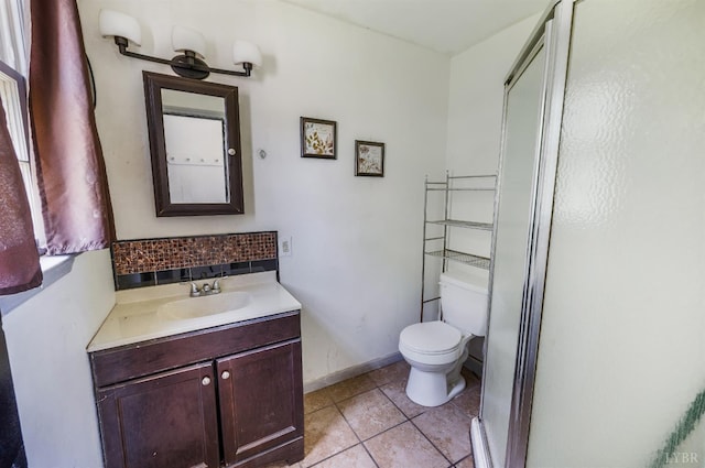 1614 Early St, Lynchburg, VA 24503 - full bathroom with vanity, tile patterned floors, a stall shower, and decorative backsplash