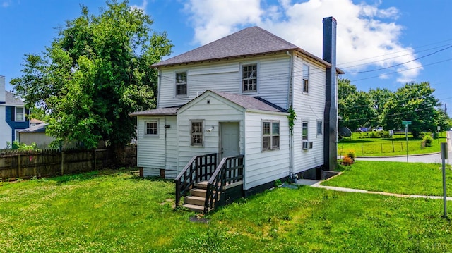 1614 Early St, Lynchburg, VA 24503 - rear view of house with a chimney, roof with shingles, and cooling unit