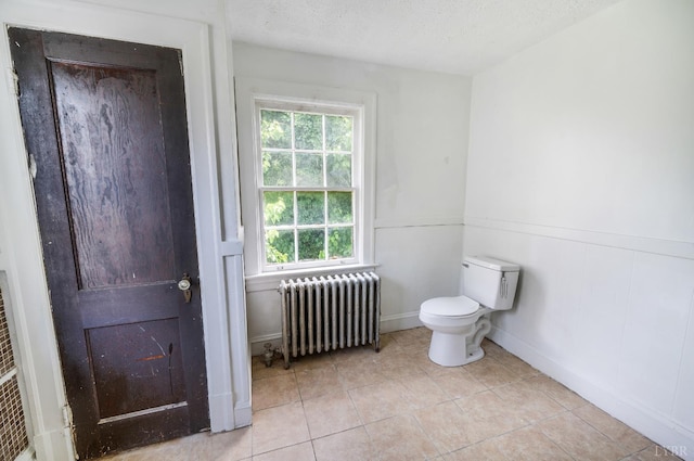 1614 Early St, Lynchburg, VA 24503 - bathroom featuring radiator, tile patterned floors, and a textured ceiling