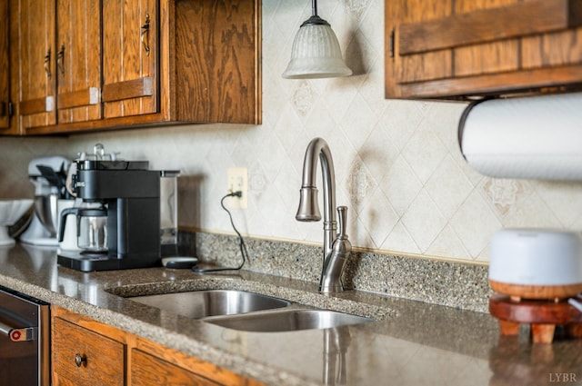 1159 Cifax Rd, Forest, VA 24551 - kitchen with decorative backsplash, brown cabinetry, dark stone counters, and dishwashing machine
