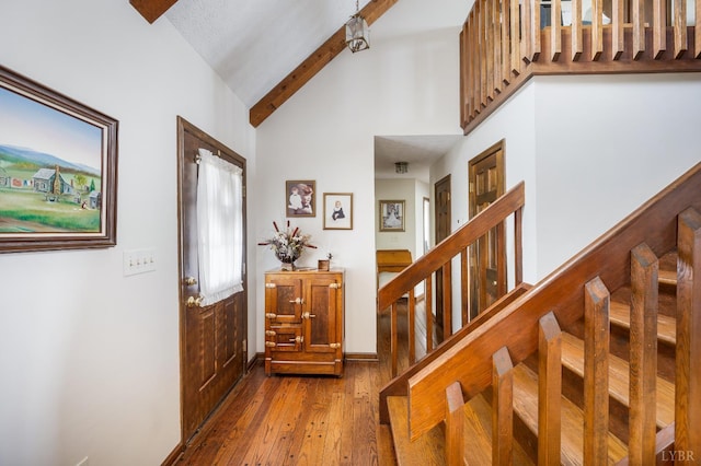 1159 Cifax Rd, Forest, VA 24551 - entryway with wood-type flooring, stairway, beam ceiling, and high vaulted ceiling
