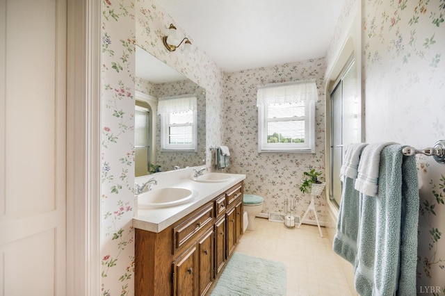 1159 Cifax Rd, Forest, VA 24551 - full bath with wallpapered walls, double vanity, healthy amount of natural light, a shower with door, and tile patterned floors
