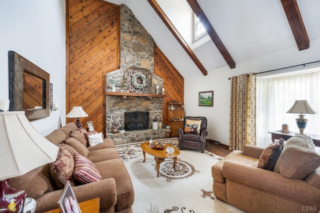 1159 Cifax Rd, Forest, VA 24551 - living area featuring high vaulted ceiling, beam ceiling, wood finished floors, a fireplace, and wooden walls