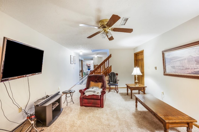1159 Cifax Rd, Forest, VA 24551 - carpeted living area featuring a ceiling fan and stairway
