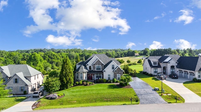 1424 Lake Manor Dr, Forest, VA 24551 - view of front of property featuring stone siding, a front yard, and driveway
