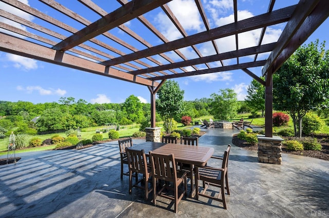 1424 Lake Manor Dr, Forest, VA 24551 - view of patio featuring outdoor dining space, a fire pit, a pergola, and view of scattered trees