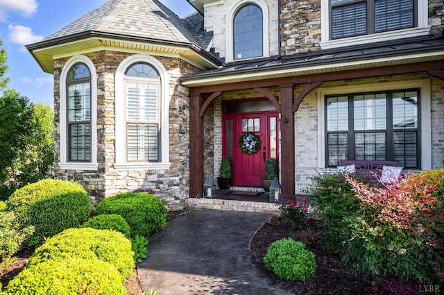 1424 Lake Manor Dr, Forest, VA 24551 - entrance to property with covered porch, a standing seam roof, and stone siding