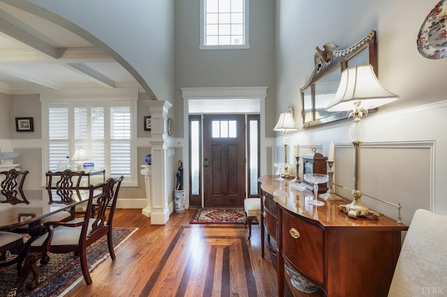1424 Lake Manor Dr, Forest, VA 24551 - foyer entrance with arched walkways, wood finished floors, plenty of natural light, beamed ceiling, and ornamental molding