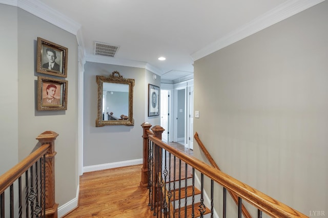 1424 Lake Manor Dr, Forest, VA 24551 - hallway with an upstairs landing, recessed lighting, light wood-style flooring, and crown molding