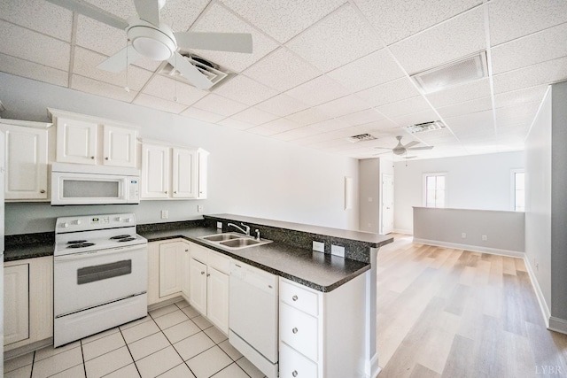 1313 Enterprise, Lynchburg, VA 24502 - kitchen with white appliances, a ceiling fan, a drop ceiling, a peninsula, and dark countertops