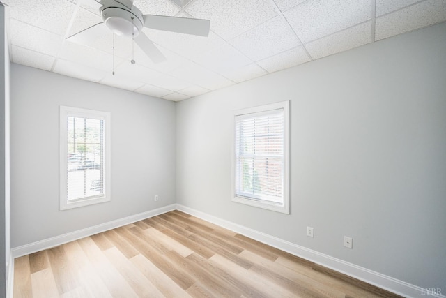 1313 Enterprise, Lynchburg, VA 24502 - empty room featuring a paneled ceiling, light wood finished floors, and ceiling fan
