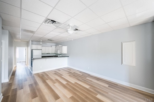 1313 Enterprise, Lynchburg, VA 24502 - unfurnished living room featuring light wood-style flooring, a paneled ceiling, and a ceiling fan