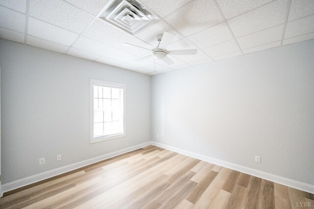 1313 Enterprise, Lynchburg, VA 24502 - unfurnished room featuring a paneled ceiling, light wood finished floors, and a ceiling fan