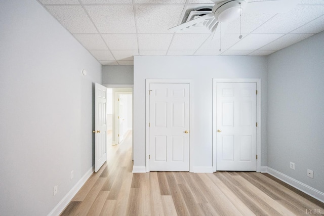 1313 Enterprise, Lynchburg, VA 24502 - unfurnished bedroom with light wood finished floors, a paneled ceiling, and ceiling fan