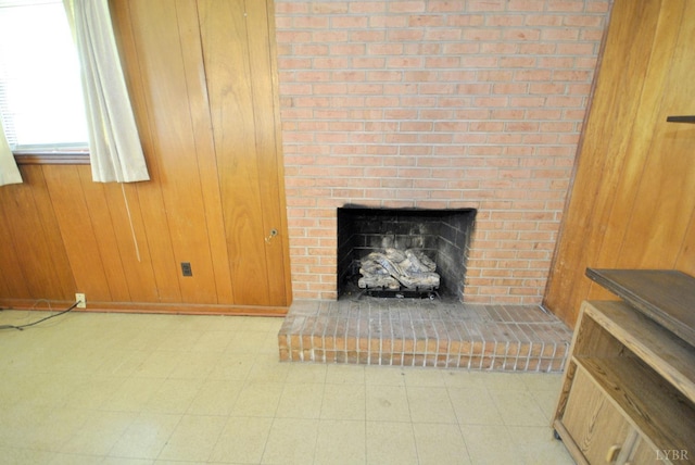 315 Cork St, Lynchburg, VA 24503 - detailed view of a brick fireplace, wood walls, and tile patterned floors