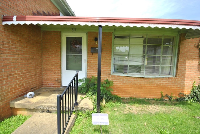 315 Cork St, Lynchburg, VA 24503 - view of exterior entry featuring brick siding