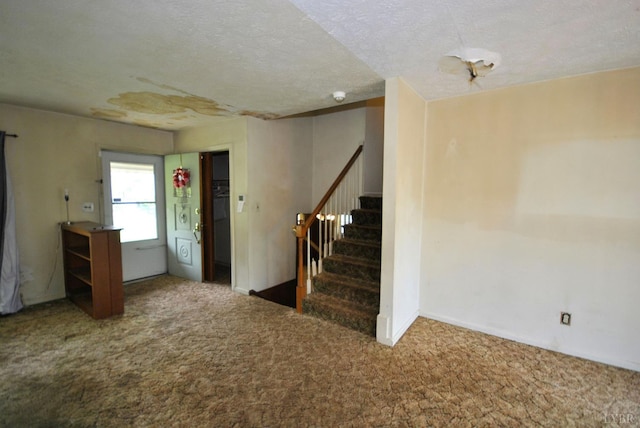 315 Cork St, Lynchburg, VA 24503 - entryway with carpet floors, stairway, and a textured ceiling