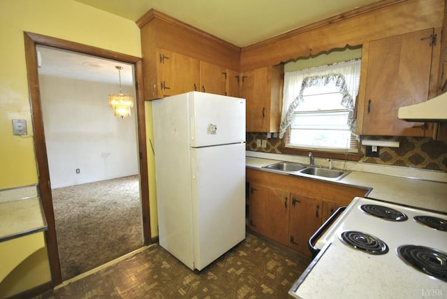 315 Cork St, Lynchburg, VA 24503 - kitchen featuring white appliances, brown cabinets, light countertops, and decorative backsplash