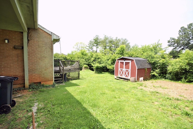315 Cork St, Lynchburg, VA 24503 - view of grassy yard featuring a shed and a wooden deck