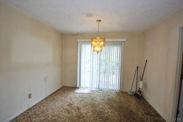 315 Cork St, Lynchburg, VA 24503 - unfurnished dining area featuring carpet flooring and a chandelier