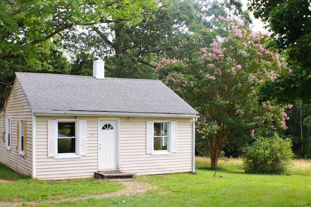 300 Mollies Creek Rd, Gladys, VA 24554 - bungalow-style house featuring a chimney, a shingled roof, and a front lawn