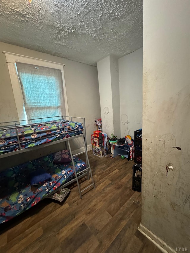 2402 Fairview Ave, Lynchburg, VA 24501 - bedroom with wood finished floors and a textured ceiling