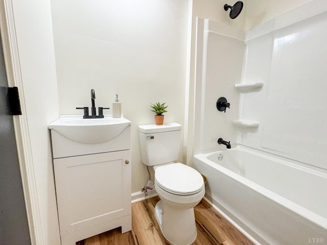 1033 8th St, Altavista, VA 24517 - full bathroom featuring wood finished floors, bathtub / shower combination, and vanity
