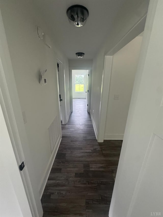 601 Mockingbird Ln, Gladstone, VA 24553 - hallway with dark wood-style floors and baseboards
