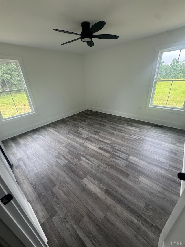 601 Mockingbird Ln, Gladstone, VA 24553 - spare room with dark wood-style floors and ceiling fan