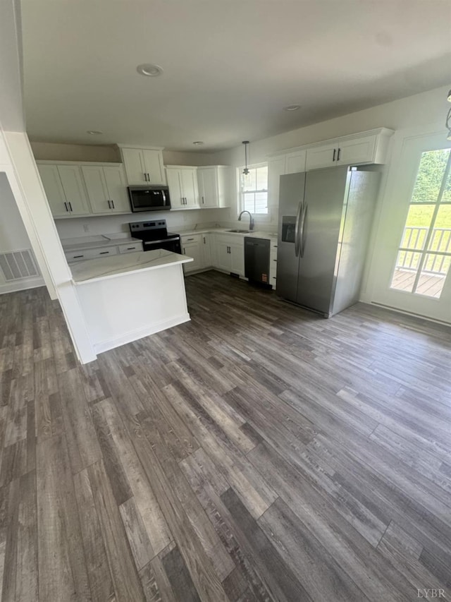 601 Mockingbird Ln, Gladstone, VA 24553 - kitchen with stainless steel appliances, dark wood-style floors, white cabinetry, and recessed lighting