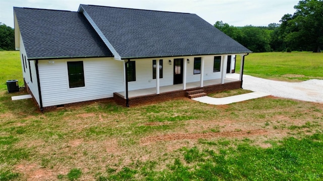 601 Mockingbird Ln, Gladstone, VA 24553 - view of front of home featuring covered porch, a front yard, and roof with shingles