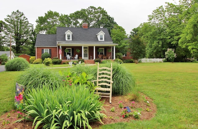 1538 Redfields Rd, Appomattox, VA 24522 - new england style home featuring covered porch, brick siding, and a chimney