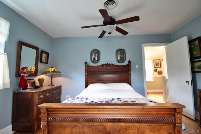 1538 Redfields Rd, Appomattox, VA 24522 - bedroom featuring wood finished floors and a ceiling fan