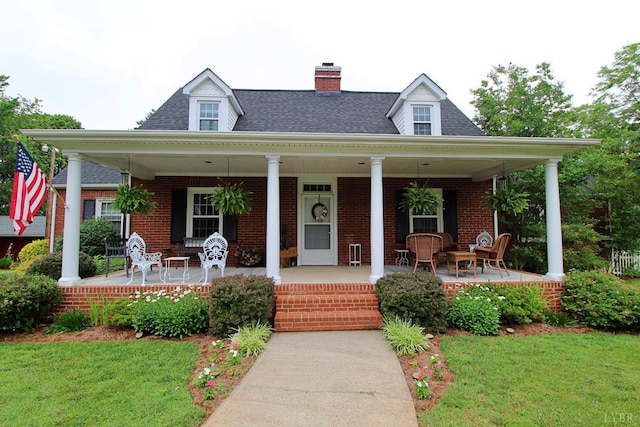 1538 Redfields Rd, Appomattox, VA 24522 - view of front facade featuring a porch, a chimney, a front yard, and roof with shingles