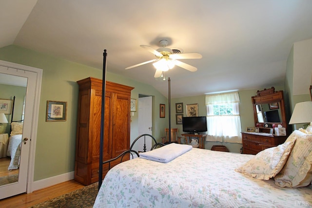 1538 Redfields Rd, Appomattox, VA 24522 - bedroom featuring lofted ceiling, wood finished floors, and ceiling fan