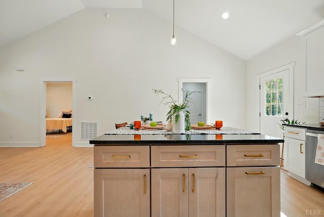 201 Thomas Rd, Lynchburg, VA 24501 - kitchen featuring high vaulted ceiling, light wood-type flooring, dishwasher, a center island, and hanging light fixtures