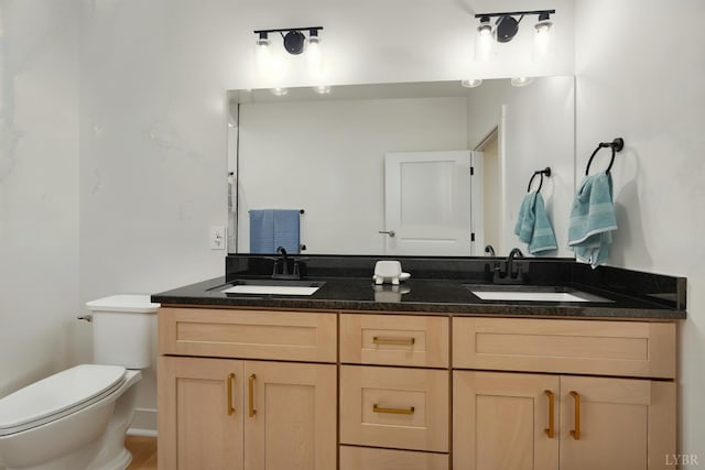 201 Thomas Rd, Lynchburg, VA 24501 - bathroom featuring double vanity and toilet
