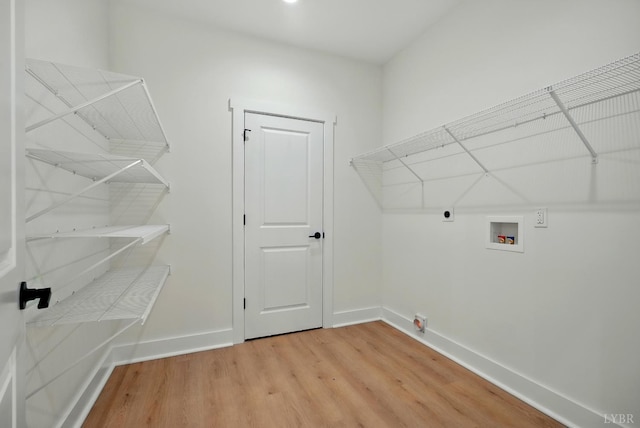 201 Thomas Rd, Lynchburg, VA 24501 - laundry area featuring hookup for a washing machine, light wood-style floors, and hookup for an electric dryer