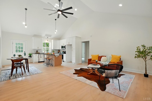 201 Thomas Rd, Lynchburg, VA 24501 - living room featuring a ceiling fan, high vaulted ceiling, light wood-style flooring, and recessed lighting