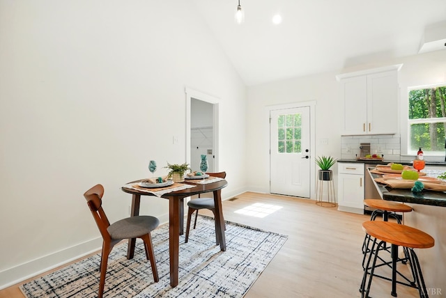 201 Thomas Rd, Lynchburg, VA 24501 - dining room with light wood-type flooring and high vaulted ceiling