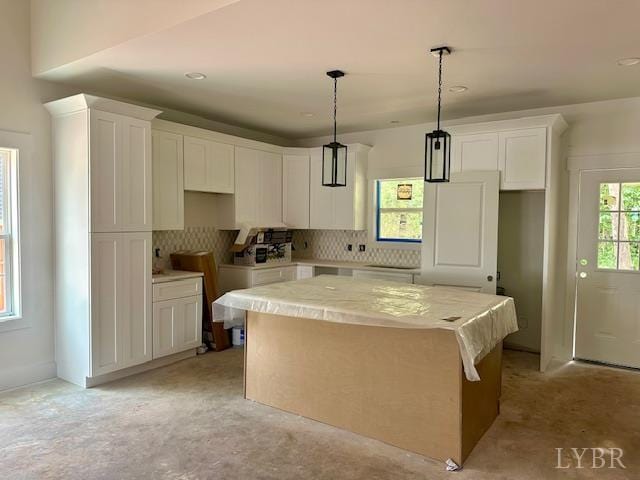 128 Riverside Dr, Lynchburg, VA 24503 - kitchen with a kitchen island, white cabinetry, decorative backsplash, and recessed lighting