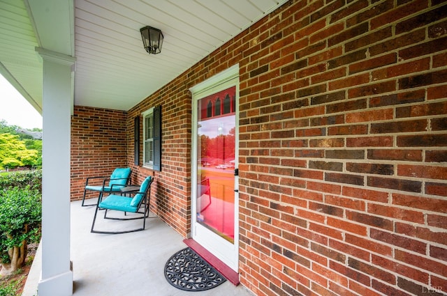 313 Robin Dr, Lynchburg, VA 24502 - property entrance featuring covered porch and brick siding