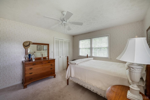 313 Robin Dr, Lynchburg, VA 24502 - bedroom featuring a closet, carpet floors, ceiling fan, and wallpapered walls