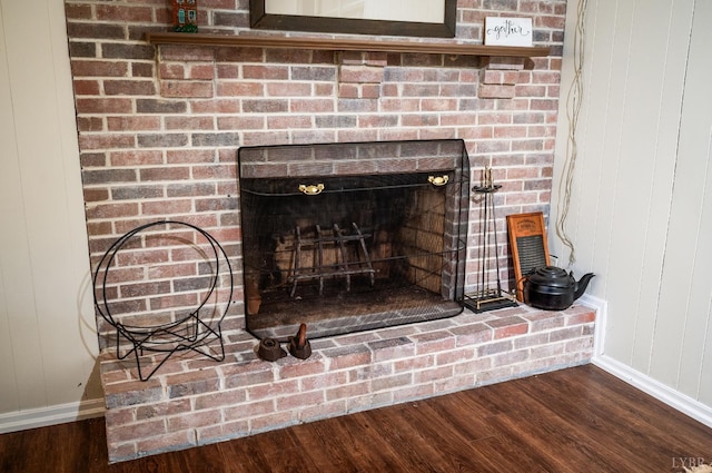 313 Robin Dr, Lynchburg, VA 24502 - detailed view of wood finished floors and a brick fireplace