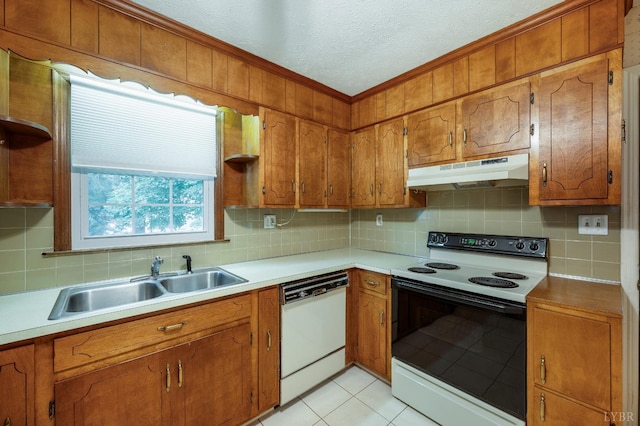 313 Robin Dr, Lynchburg, VA 24502 - kitchen with white appliances, under cabinet range hood, decorative backsplash, brown cabinetry, and ornamental molding