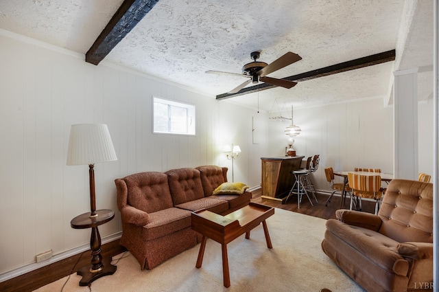 313 Robin Dr, Lynchburg, VA 24502 - living area with wood finished floors, ceiling fan, beam ceiling, crown molding, and a textured ceiling